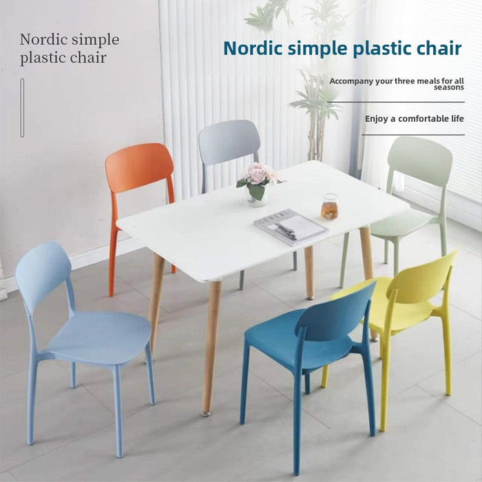 Nordic simple plastic integrated molding chair household thickened versatile stackable storage space-saving plastic dining chair